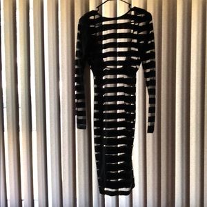 Black bodycon dress.